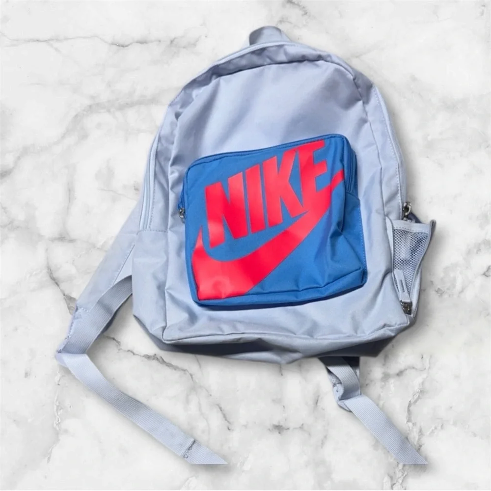 Nike Classic Kids' Backpack in Football Grey with a University Blue Bright logo
